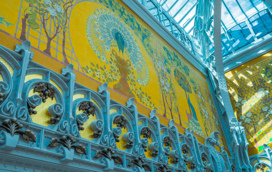 Art nouveau frescos adorn the main atrium inside the Samaritaine